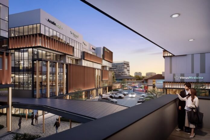 Tampilan eksterior komersial Powell Studio Loft di D-HUB SEZ BSD City, menunjukkan fasad modern dan area parkir yang luas, dengan orang-orang berinteraksi di luar.