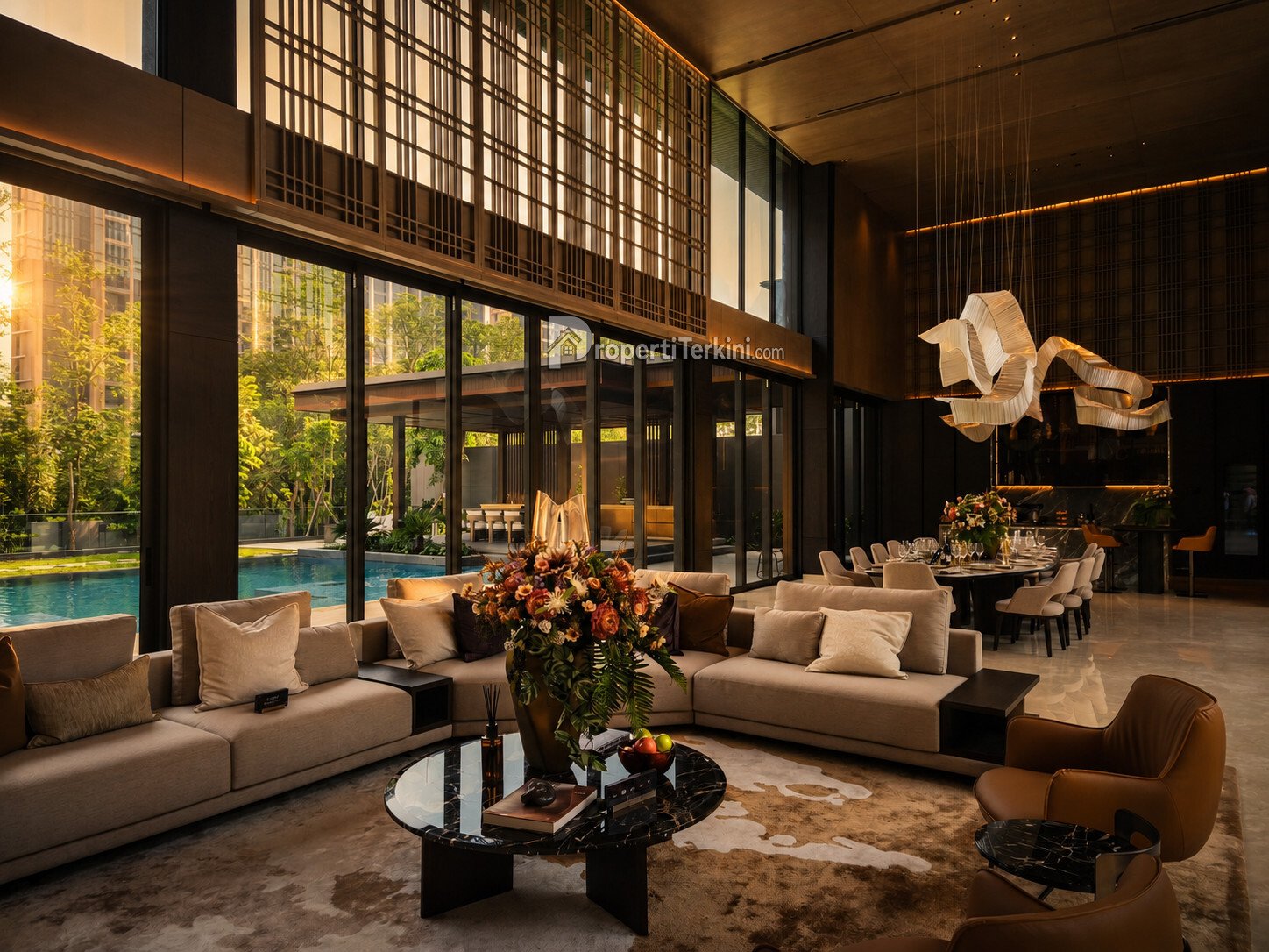 Desain interior ruang tamu ultra-luxury rumah island villa navapark bsd city seharga rp150 miliar dengan pemandangan kolam renang pribadi.