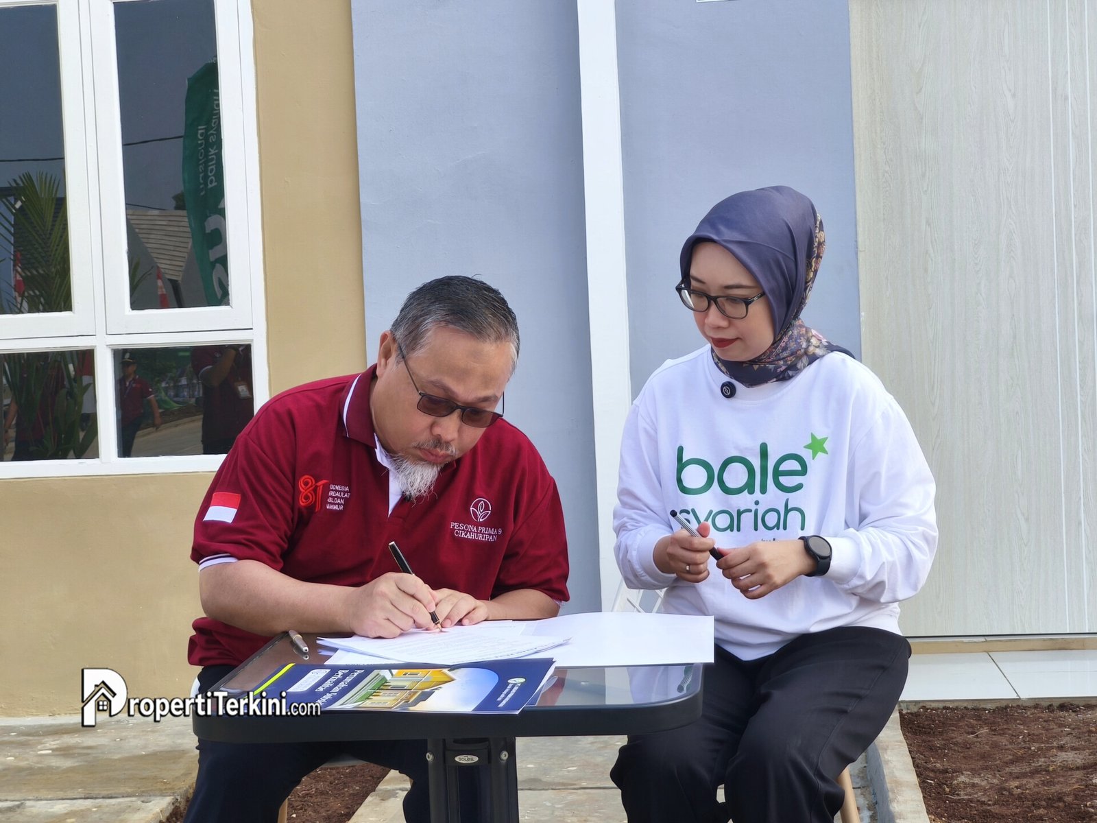 Serah terima unit rumah Pesona Prima 9 Cikahuripan dari PT Kreasi Prima Nusantara kepada BSN dalam akad massal pembiayaan syariah