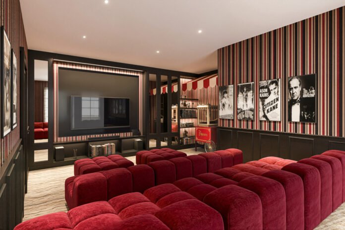 Interior ruang bioskop pribadi home theater di rumah mewah tipe AGNA The Gramercy Alam Sutera dengan sofa merah eksklusif